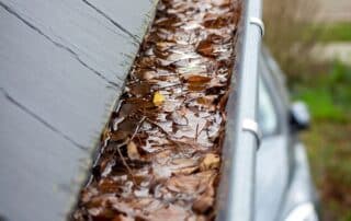 clogged gutters on home