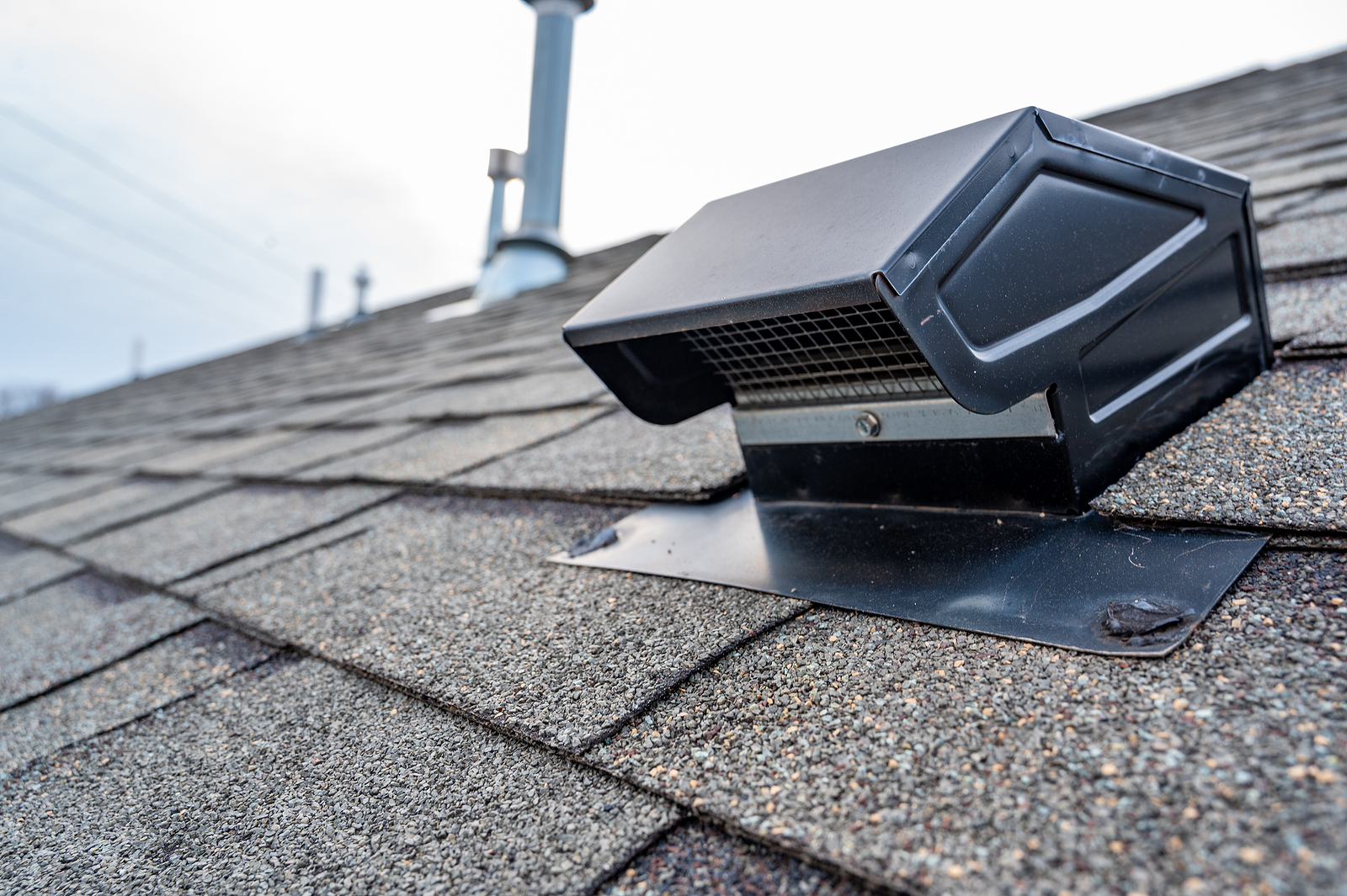 Static Vent Installed On A Shingle Roof For Passive Attic Ventil