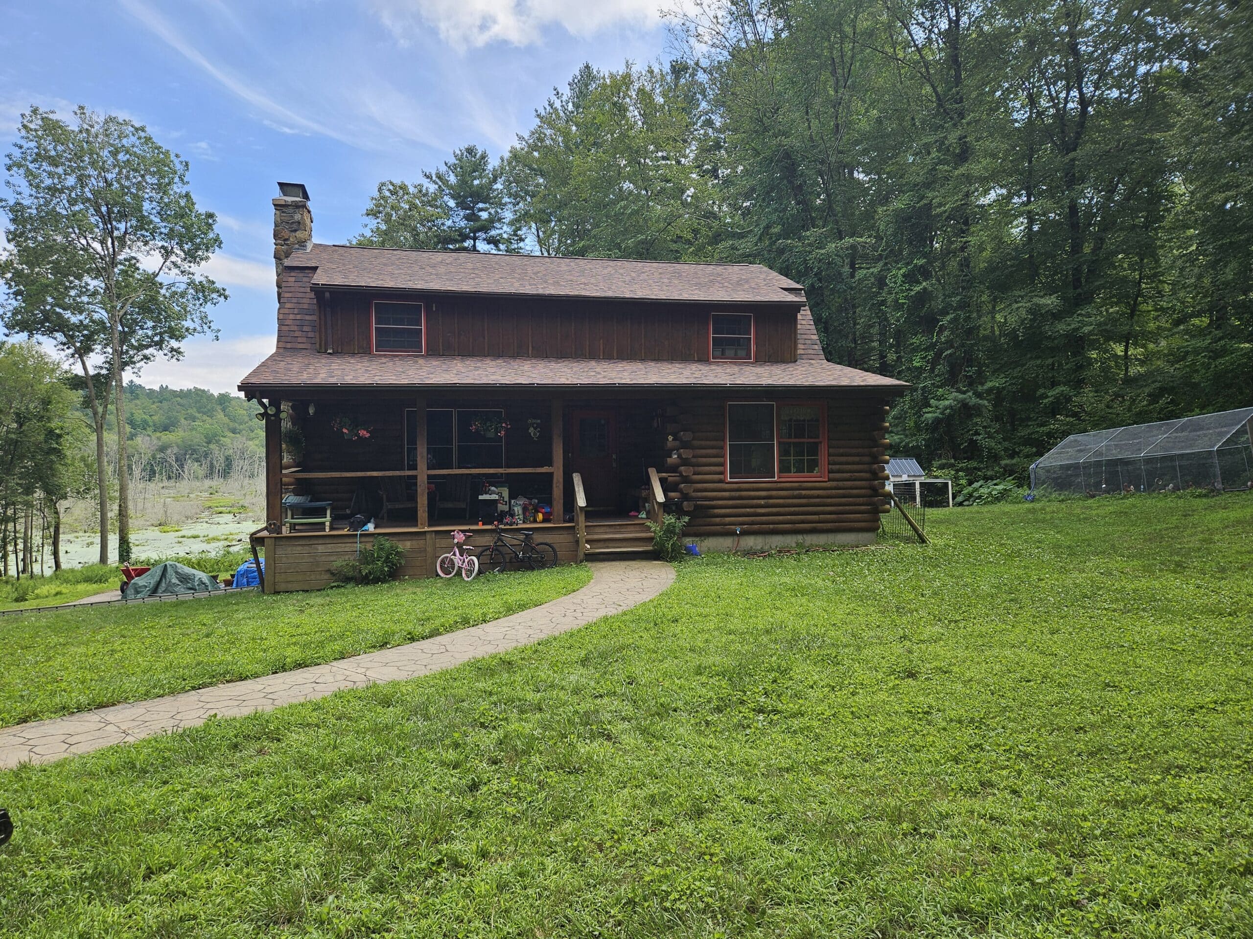 Installed Burnt Sienna CertainTeed roof by roofing contractors Connecticut during roof replacement in Griswold, CT.