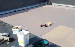 A skilled team from commercial roofing companies in Norwich installing a durable roof.