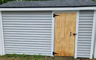 Vinyl siding installation on a house in Norwich, CT showcasing durability and style.