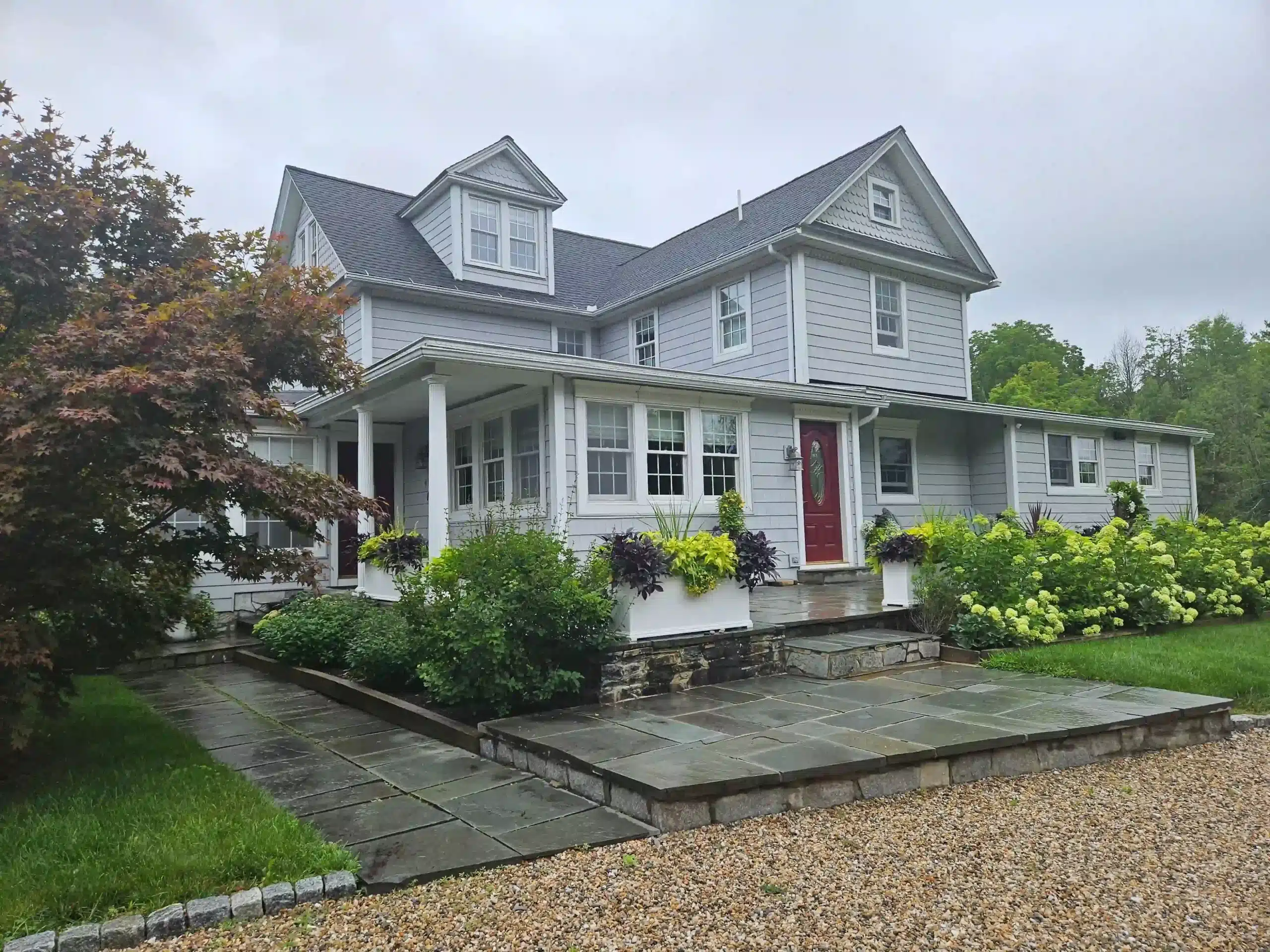 Newly installed CertainTeed Moiré Black shingles on a residential roof in Mystic, CT, completed by JS & R Roofing.