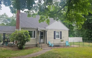 Connecticut home with an asphalt shingle roof showcasing professional roof repair CT services from JS and R Roofing.